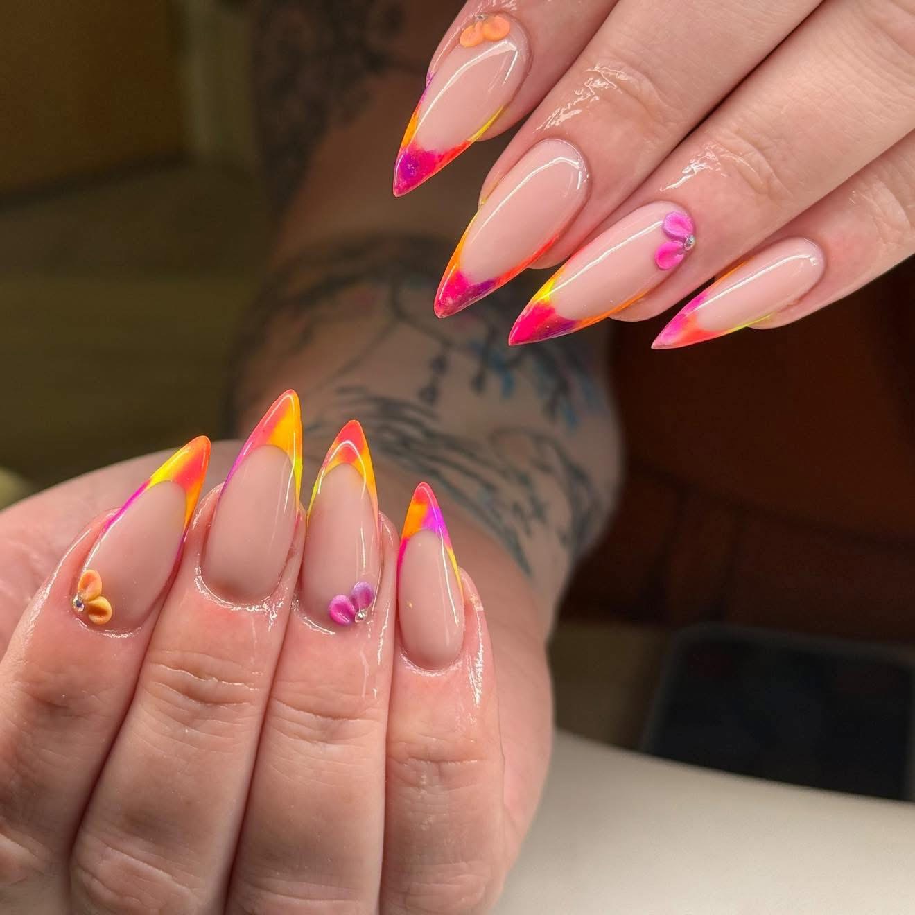 Bright neon French nails with miniature flowers